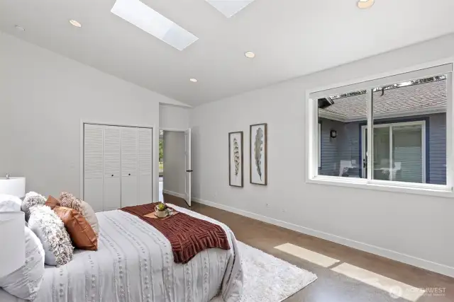Primary suite with walk-in closet and spa-like full bath ensuite.