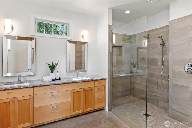 Incredible spa-like primary bath, wheelchair accessible shower - dual sinks.