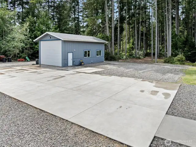 Sport court: pickleball anyone? HUGE detached garage holds 4+ vehicles, plumbed for a bath. Excellent hobby space, workshop, garage or entertainment zone!