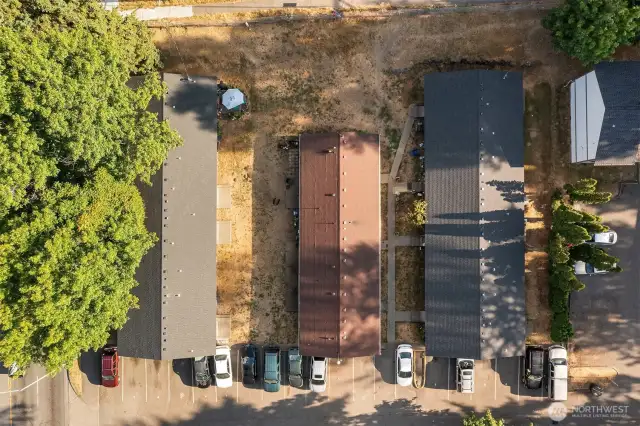 Building in the middle is not for sale by owner of this parcel.