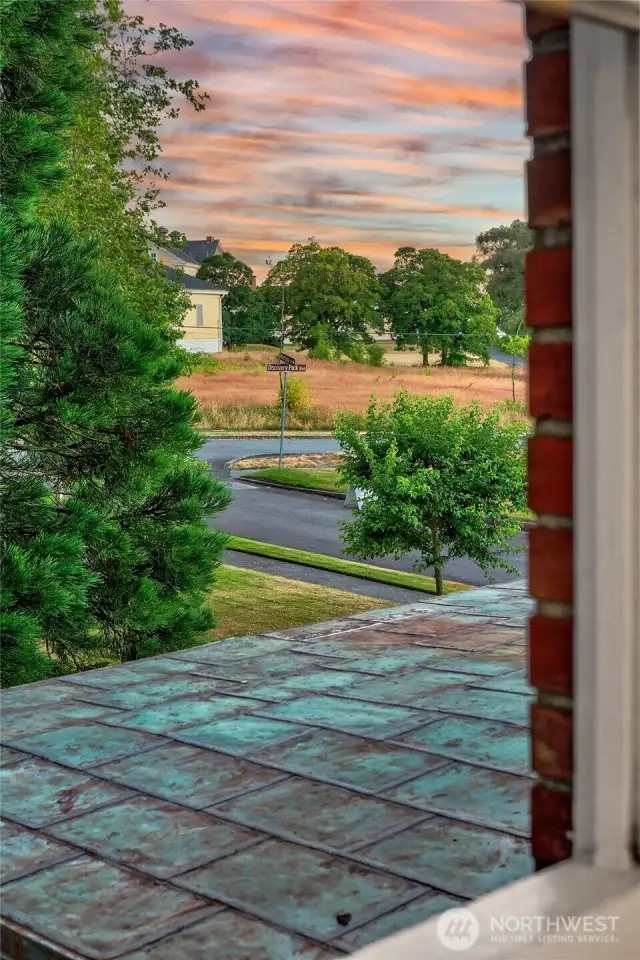 From an upper window, the former parade grounds stretch out beneath a painted sky—a view once marked by cadence calls, now softened by birdsong and breeze. Living here means holding a key to the past while rooted fully in the peace of the present.