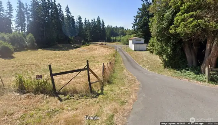 The Farm (This is where the key box is and opens this gate to view property)