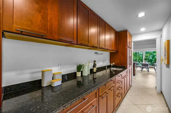 Custom granite with custom cabinets, built ins, pull out drawers and much more!