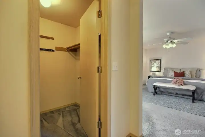 This suite is a dream for organization, boasting a spacious walk-in closet for your primary wardrobe, a secondary reach-in closet for essentials, and a dedicated linen closet to keep everything tucked away.