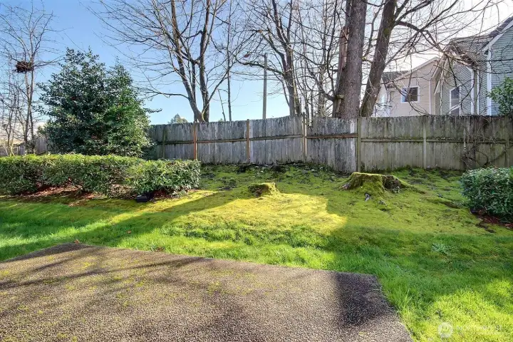 Step out onto your private patio and greenspace.