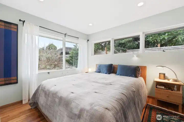 Master bedroom with an abundance of light