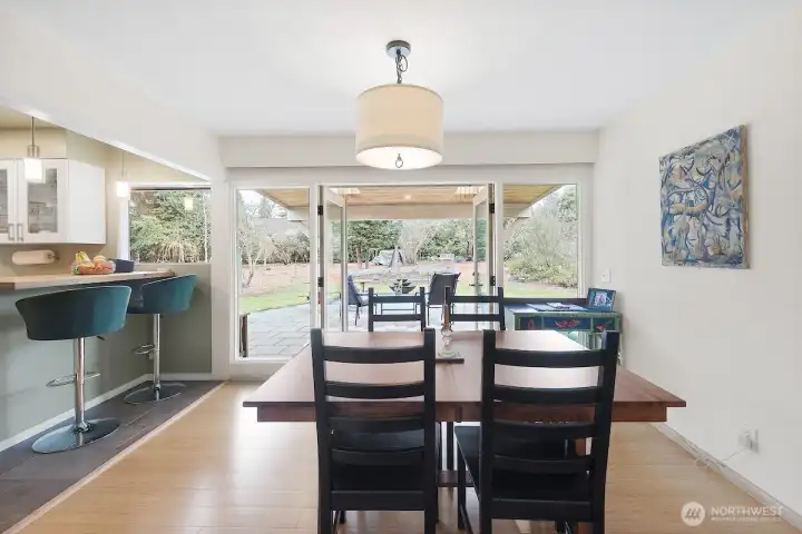 Dining room with French Doors leading to a covered Gazebo for entertaining