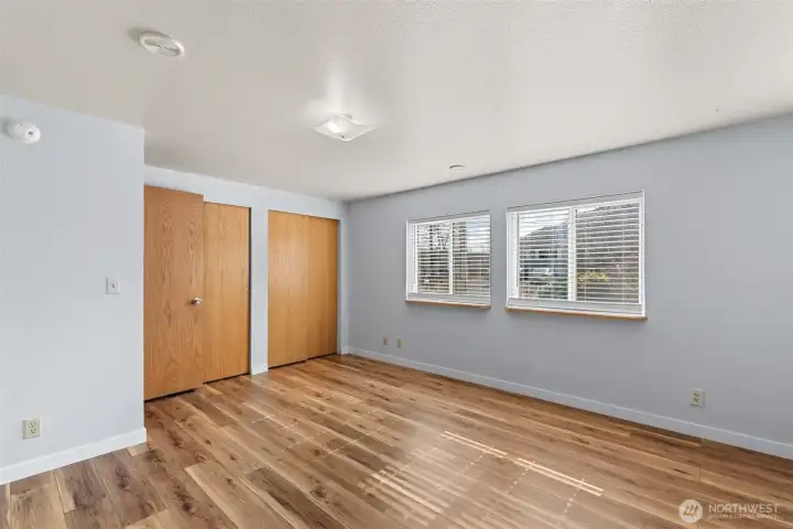 Primary bedroom with dual closets
