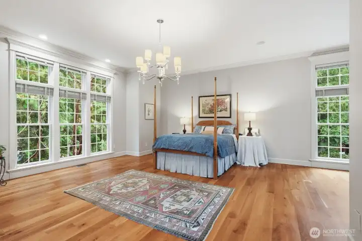 You will love the ease and convenience of the main floor primary suite, a very spacious room for all your furniture with crown molding.