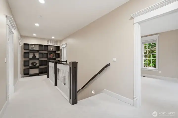 Upstairs are 3 other bedrooms, one with an ensuite bathroom, the other 2 bedrooms share a connecting Jack & Jill bathroom with a marble topped furniture style dual vanity and tiled floor.