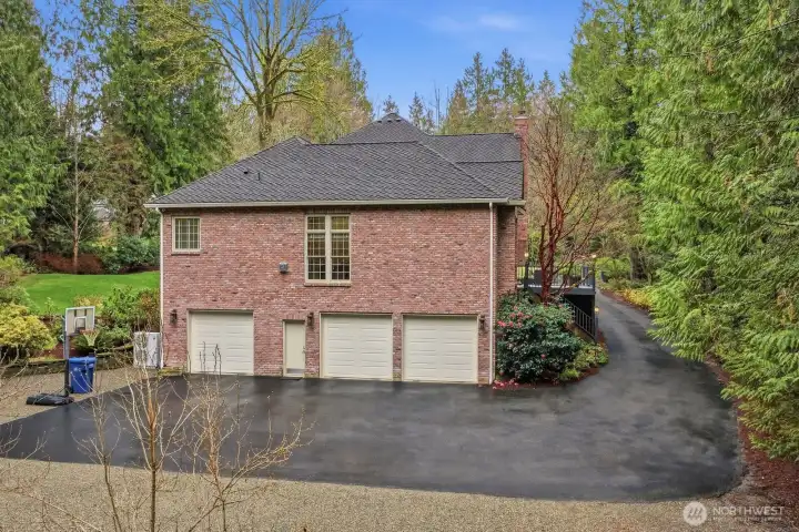 3 car garage and room for RV parking.