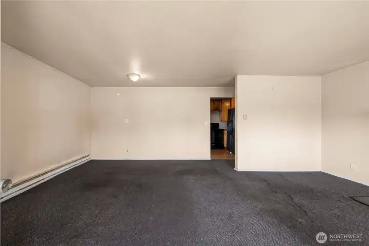 Living Room from entry, kitchen in the background