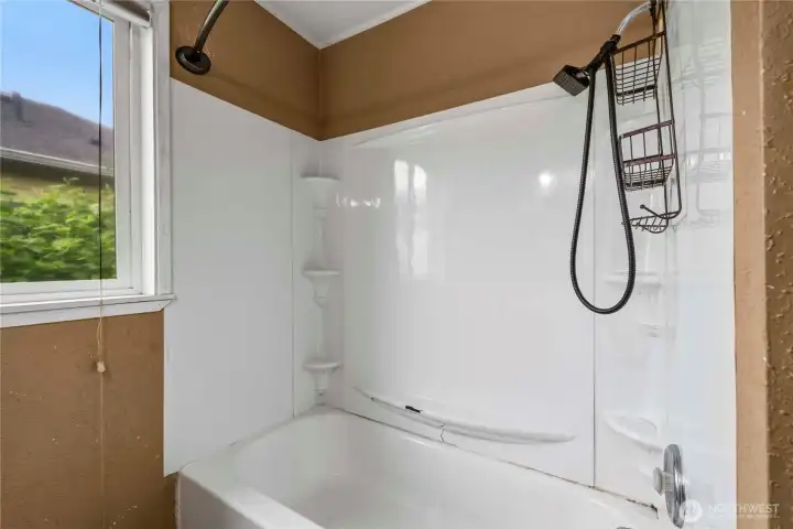Shower/tub combo completes this homes bathroom!