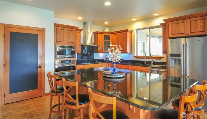 KITCHEN WITH PANTRY AND OVERSIZED ISLAND