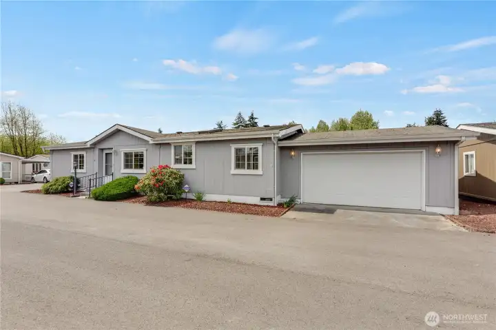 Convenient corner lot, with rare 2-car garage!