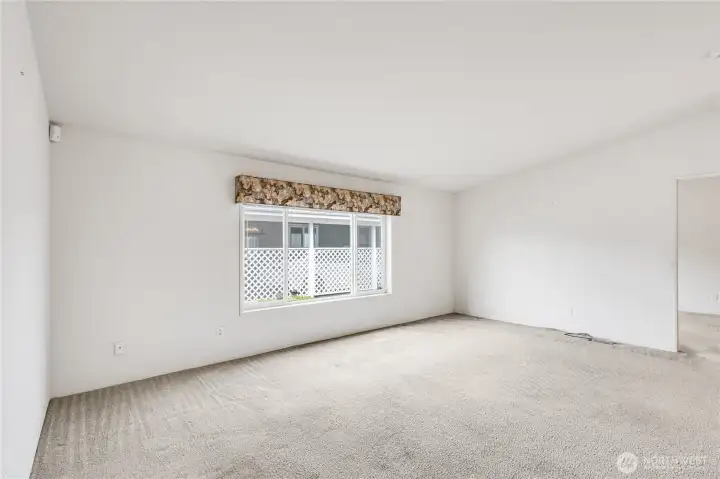 Vaulted ceilings and large windows bring in tons of natural light.