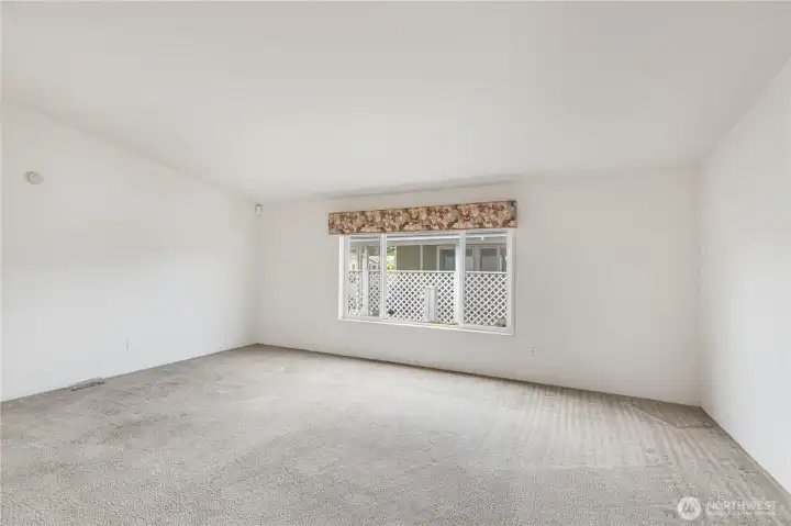 Another angle of spacious living room.