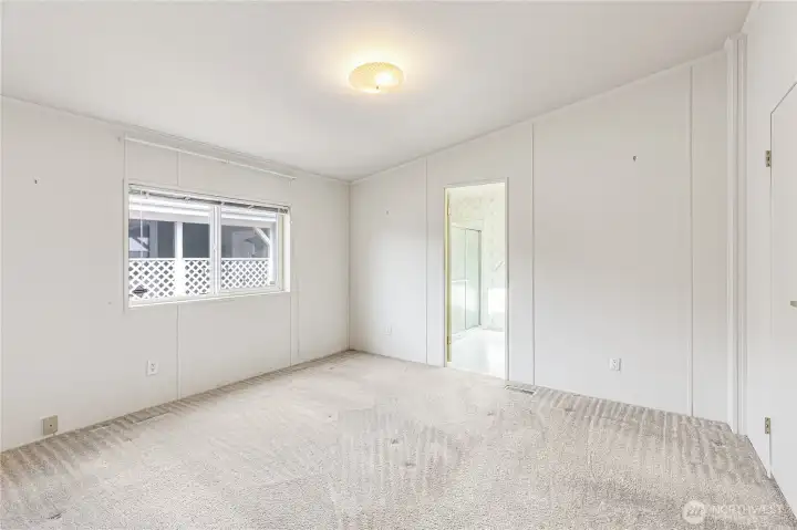 Another angle of generous Primary Bedroom.