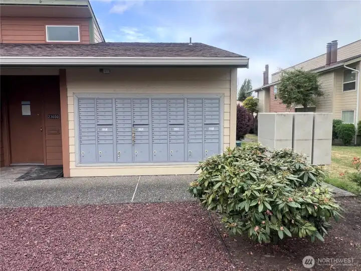 Community mailbox station with centralized mail delivery and convenient resident access in a well-maintained condominium community.