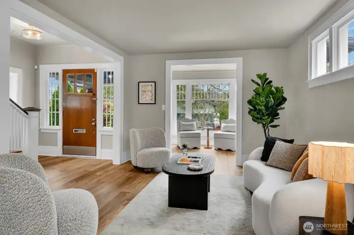Formal living opens to an English style "tea room" which can function well as front office/den