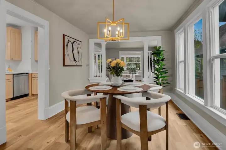 Formal dining features elegant new light fixture