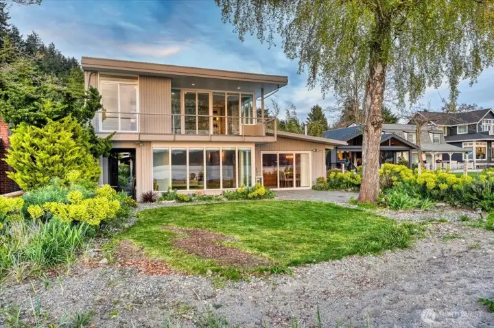 2 Story Mid-Century Modern home at golden hour.