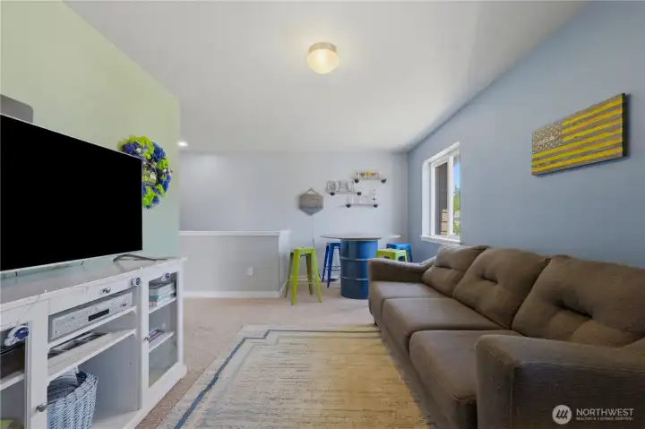 Here is additional space upstairs for movie nights, video games, or just time to get away.