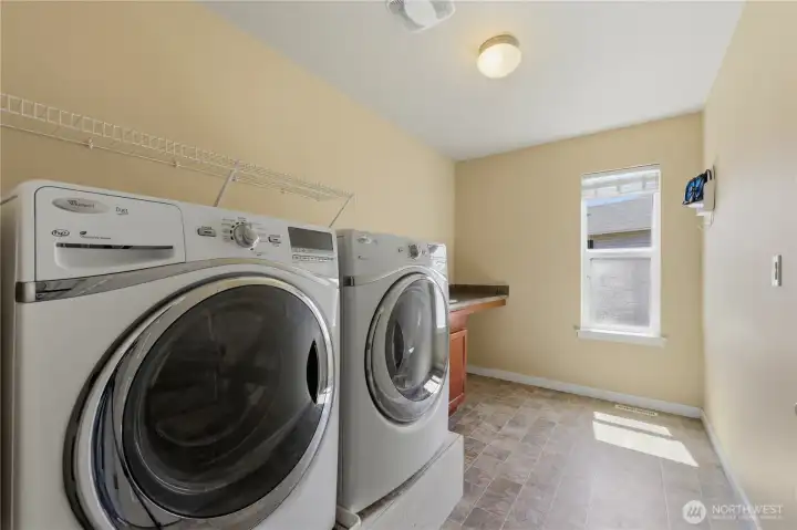 Huge laundry room WITH SINK (just can't see it in this picture)!