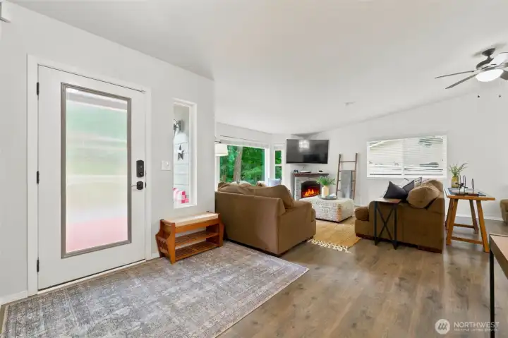 Updated waterproof laminate flooring in the main living areas Updated waterproof laminate flooring in the main living areas