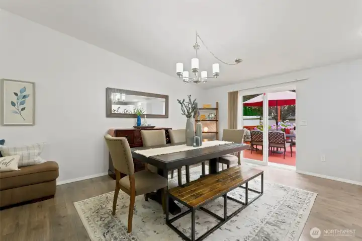 Dining room leading to expansive back deck Dining room leading to expansive back deck