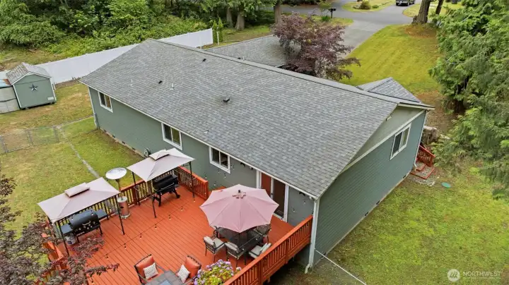 Aerial view of the home, deck, yard Aerial view of the home, deck, yard
