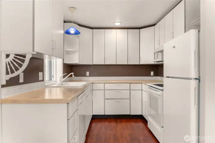 Kitchen with generous storage and convenient layout. Kitchen with generous storage and convenient layout.