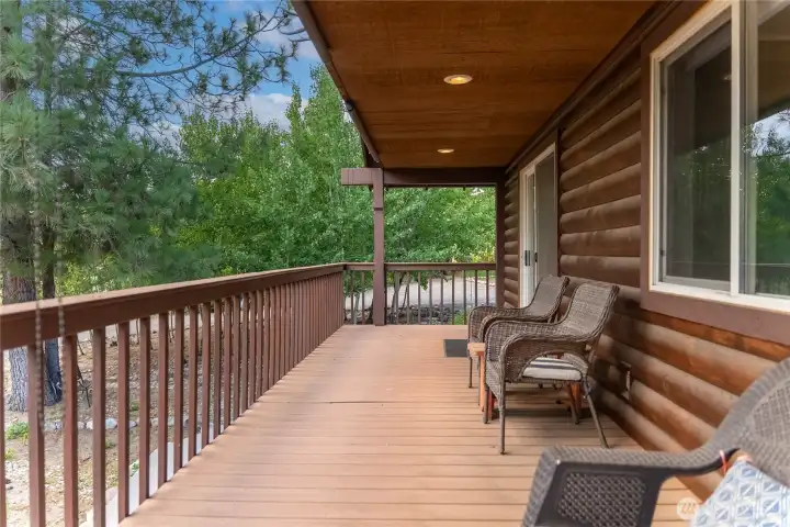 Covered deck overlooking mature shade trees and irrigated landscaping. Covered deck overlooking mature shade trees and irrigated landscaping.