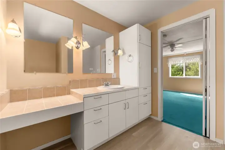 Large vanity in the primary bath with generous storage. Large vanity in the primary bath with generous storage.