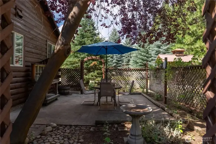 Relax or entertain on the peaceful backyard patio. Relax or entertain on the peaceful backyard patio.
