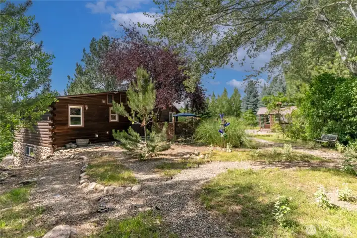 Landscaped yard offers room to garden, play, or simply enjoy the outdoors. Landscaped yard offers room to garden, play, or simply enjoy the outdoors.