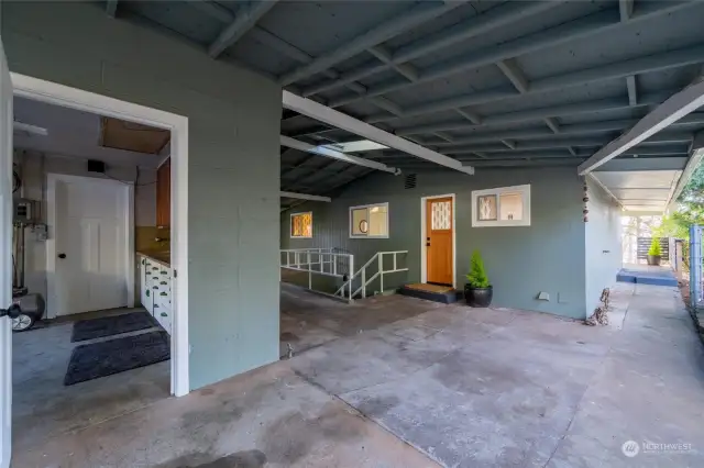 Garage to left, main entry in center.  Stairs lead to separate entrance for the finished basement.  Potential for separate living quarters.