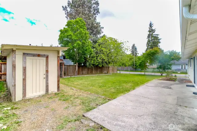 View from the side of the home, so many possibilities in this back yard!