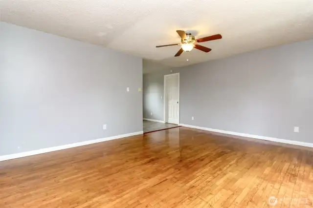 Ceiling fans are a must-have in bedrooms and living rooms because they’re a cooling, energy-efficient solution to staying comfortable on those hot summer days. Plus, the beautiful hardwood floors that you can see in this room provide an impressive, polished look that will match any decor.