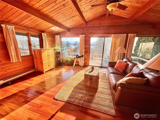 Bright and cheery living room with vaulted ceilings.
