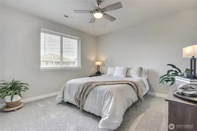 Bedroom 2 with ceiling fan.