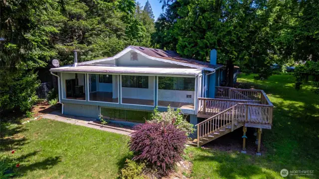Welcome home to 2553 Mackenzie Rd, your garden oasis and launching pad for kayaking, hiking, skiing and all of the great Pacific NW outdoors!