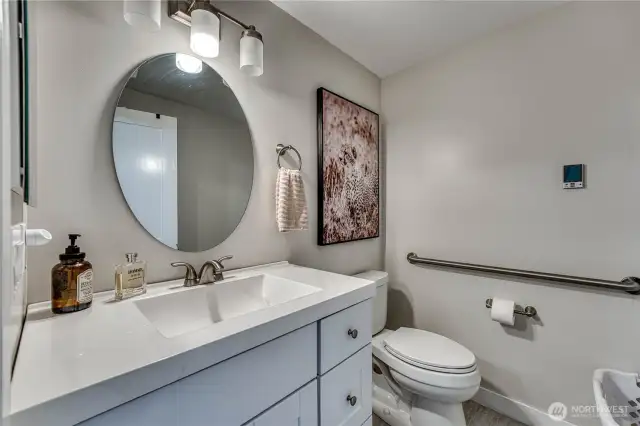 Main level bathroom attached to bedroom #1
