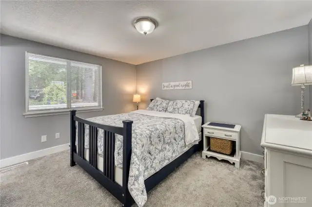 Main level bedroom with an attached 1/2 bath (3 of 3)