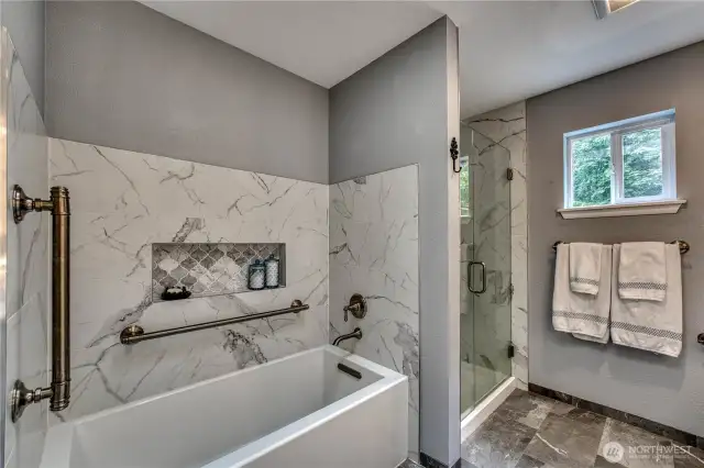 Upstairs 5-piece primary bathroom.