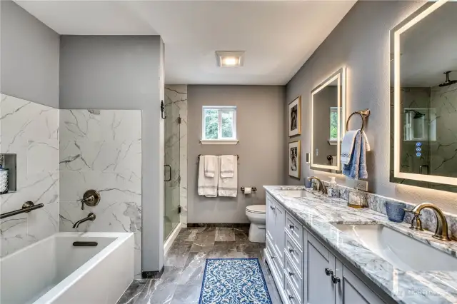 Upstairs 5-piece primary bathroom.