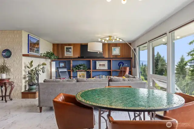 Open and inviting. Relax and view nature out of the newer vinyl windows. Almost all have been replaced including a brand new slider to the upper deck.
