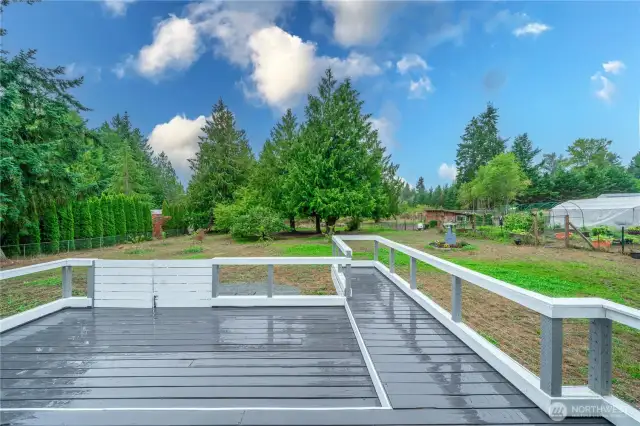 You can have lunch in the yard with your own apple, plum, pear, and cherry trees as well as your own organic blueberries. There are radishes and carrots planted around the trees, you can truly eat your way through your own property.