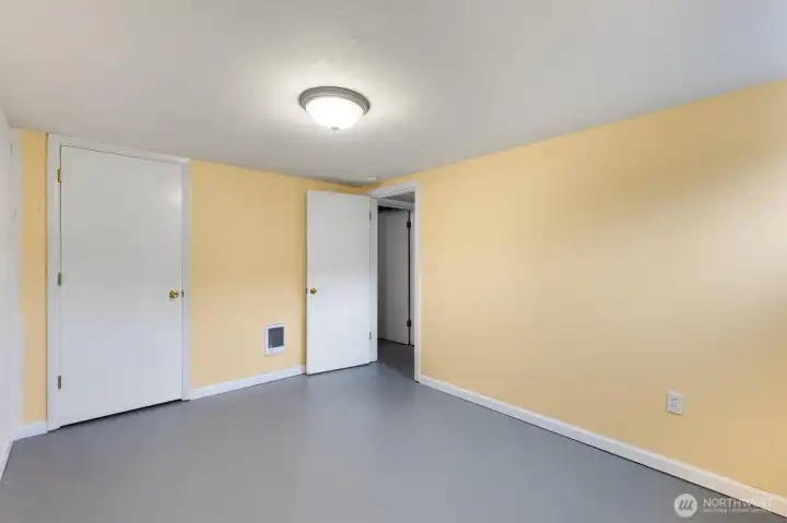 Large Basement Bedroom near bathroom
