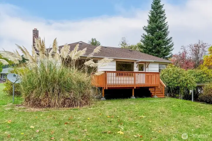 Back Deck with stairs near carport